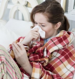 Femme atteinte de la grippe